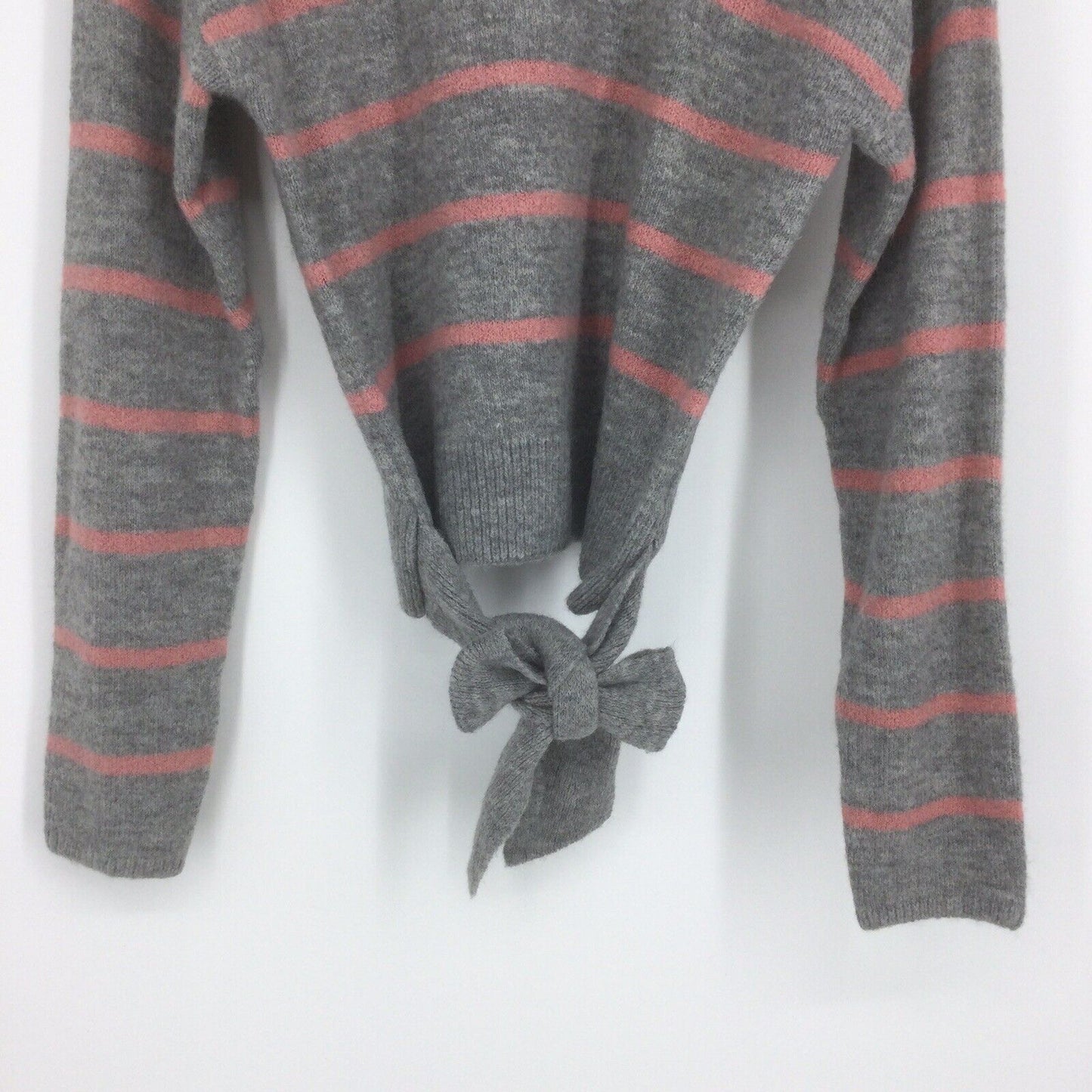 Knitted sweater with a distinctive addition from WAYF